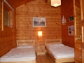 Schlafzimmer mit 2 Einzelbetten - Ferienhaus Strandgut - Ferienhäuser in Ahrenshoop